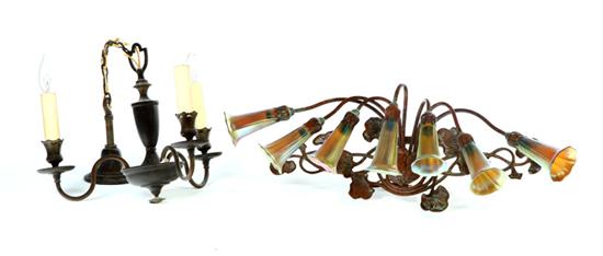 TWO LIGHTING DEVICES.  American 