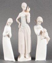 Two Lladro style porcelain fig