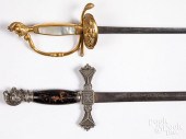 TWO LODGE SWORDS, WITH HELMET