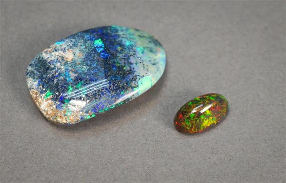 TWO LOOSE BLACK OPALS, APPROX.