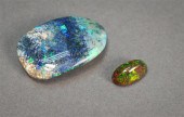 TWO LOOSE BLACK OPALS, APPROX.