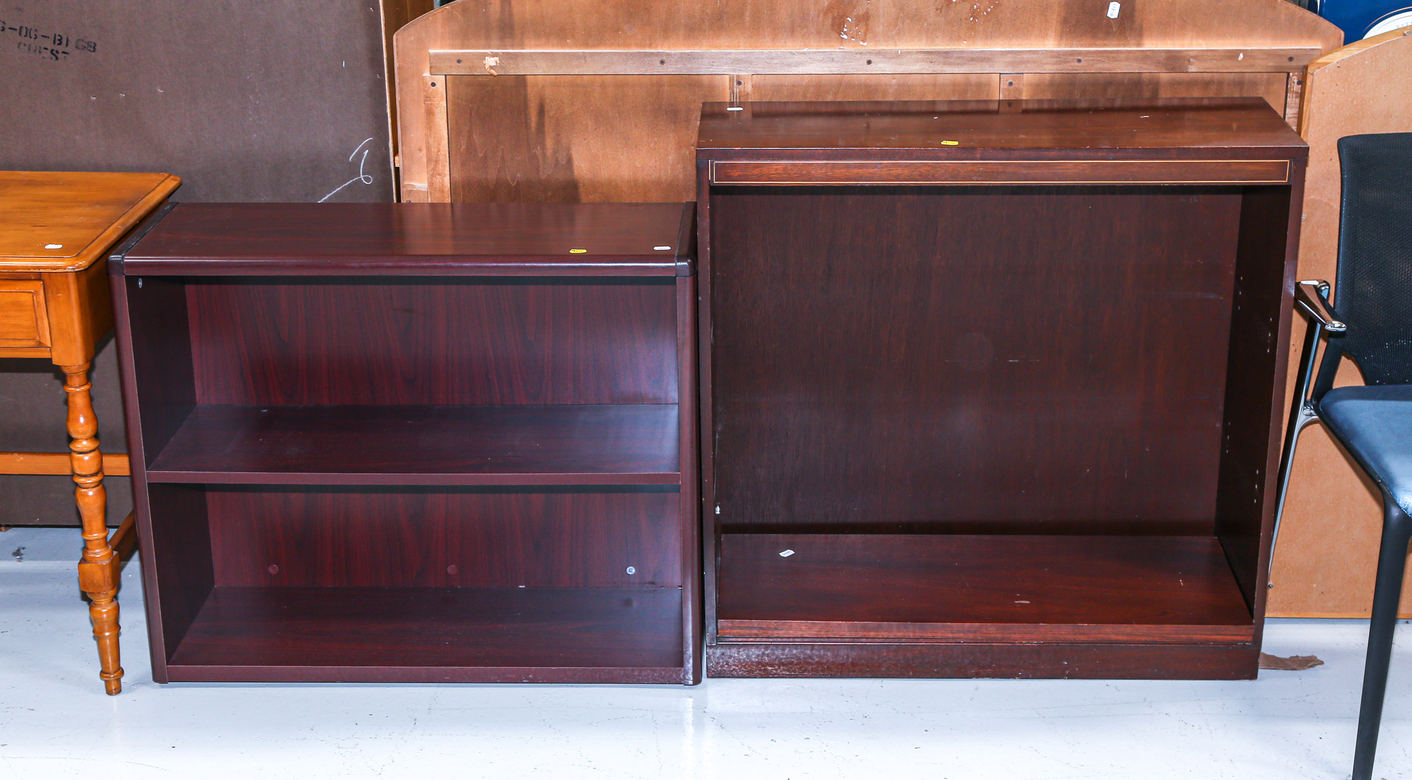 TWO LOW BOOKCASES Comprising one