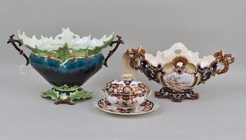 TWO MAJOLICA HANDLED URNS,