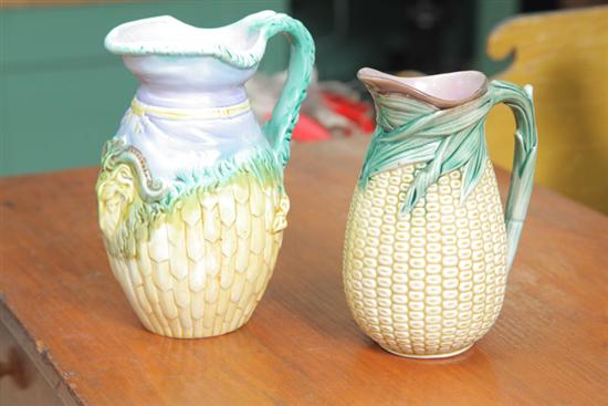 TWO MAJOLICA PITCHERS. One having a