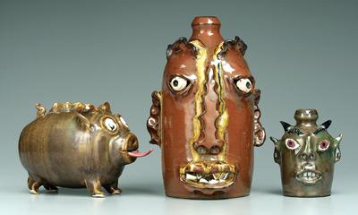 Two Marvin Bailey face jugs, pig: