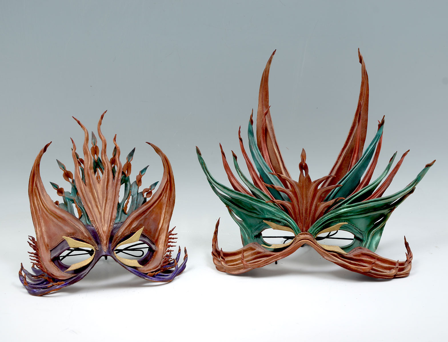 TWO MASKS BY JOHN FLEMMING MALE AND