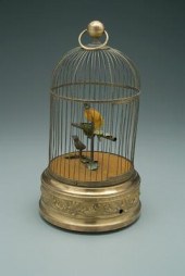 Two mechanical singing birds: