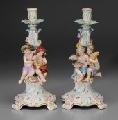 Two Meissen candlesticks: exte