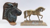 TWO METAL HORSE-FORM DOORSTOPS