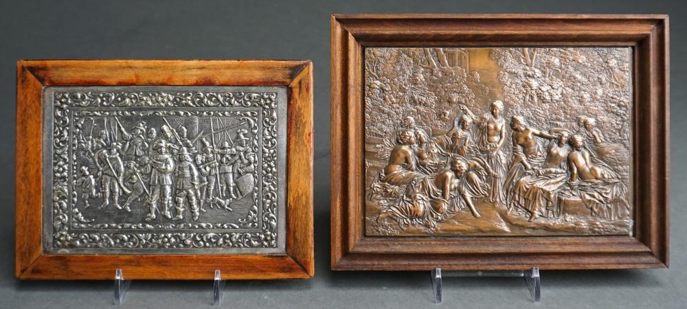TWO METAL PLAQUES IN RELIEF,