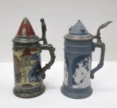 TWO METTLACH POTTERY STEINS, E