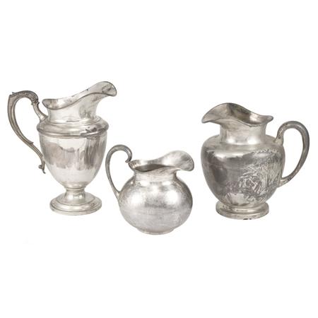 Two Mexican Silver Pitchers