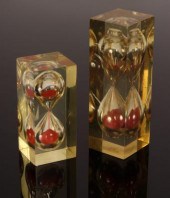 Two mid-Century lucite hourgla