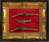 TWO MIDDLE EASTERN PISTOLS AND