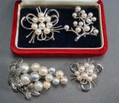 TWO MIKIMOTO SILVER AND CULTUR