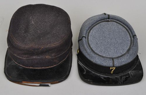 TWO MILITARY KEPIone with brass "7"