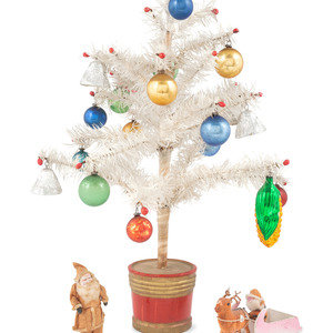 Two Miniature Composition Santa