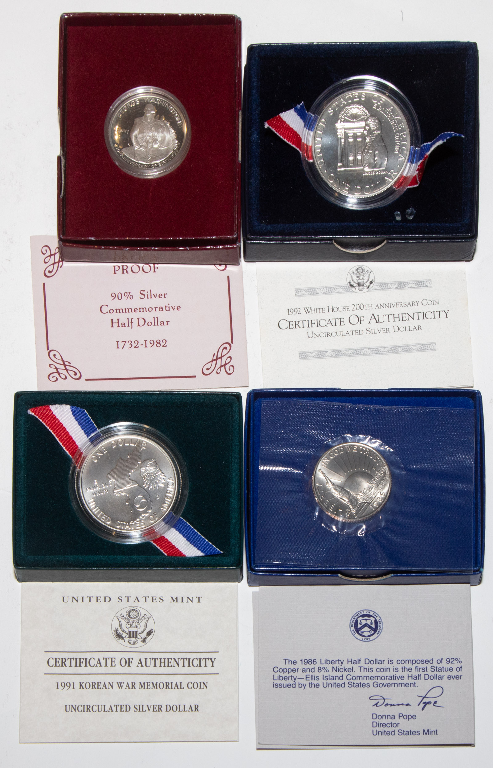 TWO MINT SILVER DOLLARS & TWO