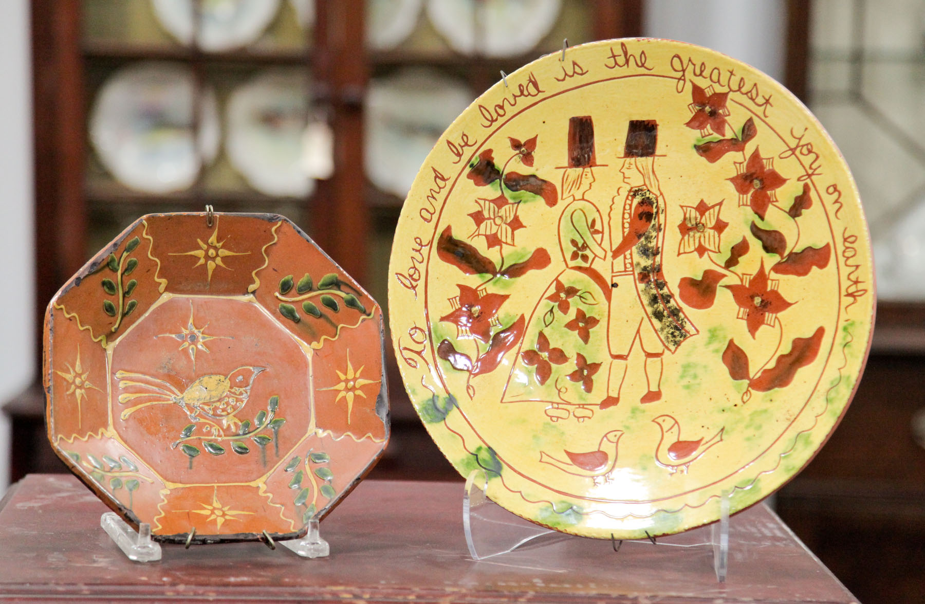 TWO MODERN REDWARE PLATES. 