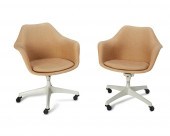 TWO MODERN TULIP SWIVEL ARMCHA