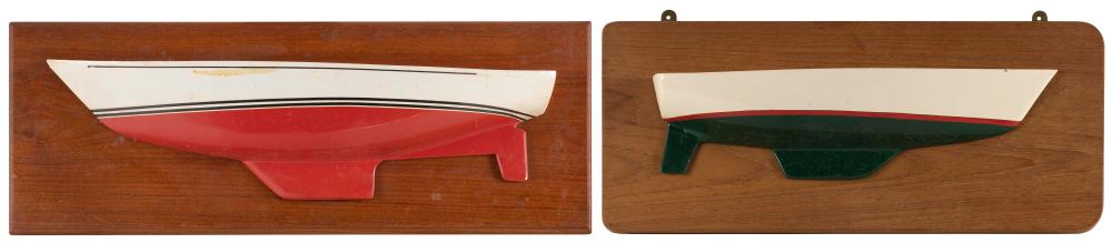 TWO MOUNTED HALF HULL MODELS OF