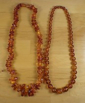 TWO NATURAL BALTIC AMBER BEAD