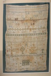     	Two needlework samplers