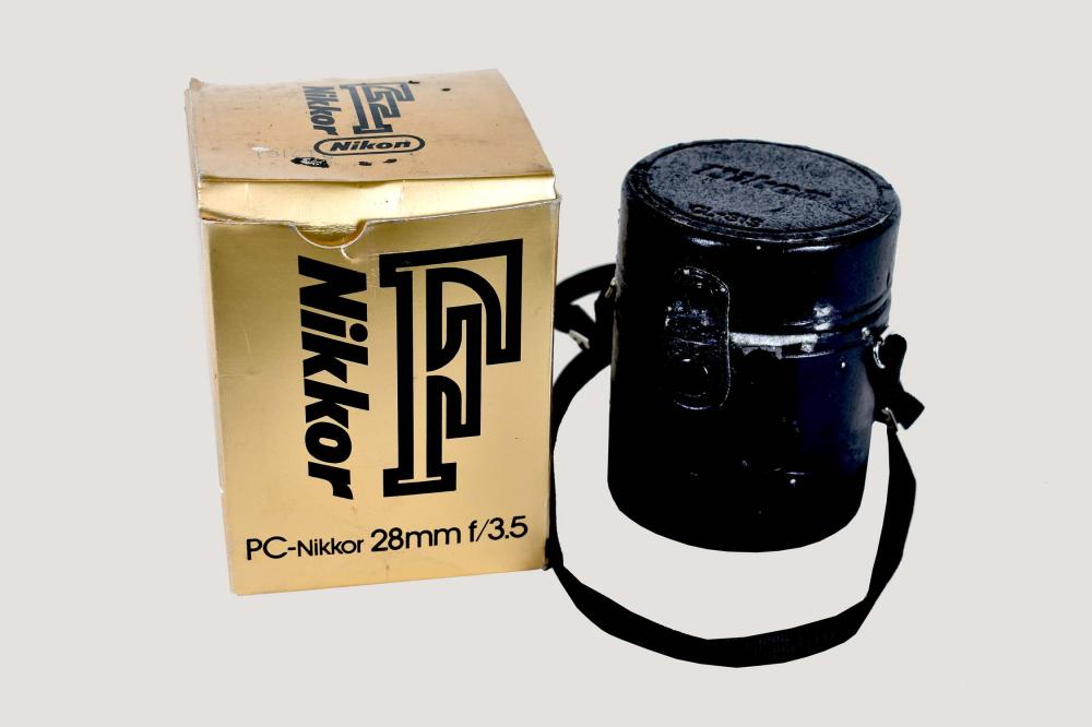 TWO NIKKOR CAMERA LENSESThe