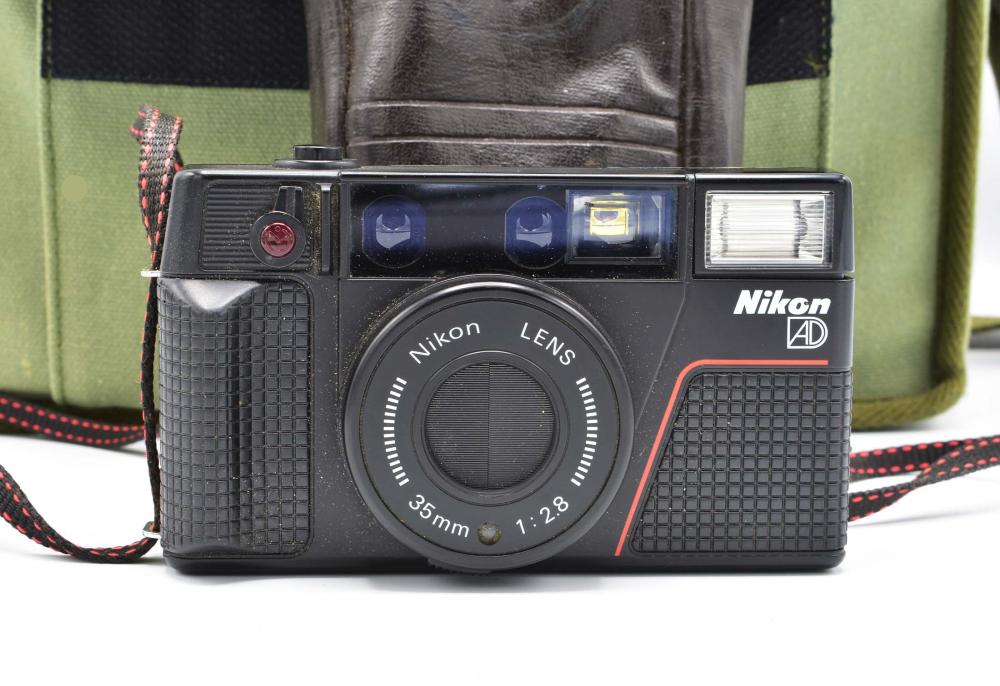 TWO NIKON CAMERAS, LENSES, A