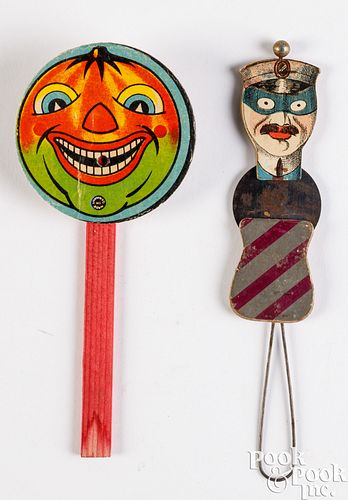 TWO NOISE MAKERSTwo noise makers,