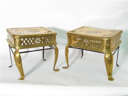 Two oblong pierced brass footman