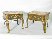 Two oblong pierced brass footm