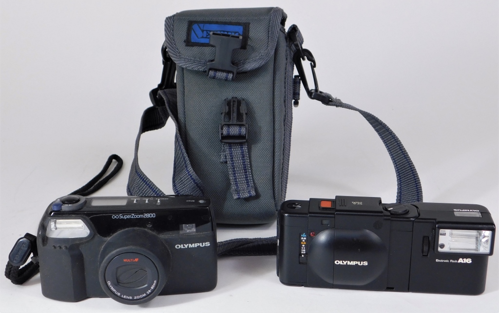 TWO OLYMPUS 35MM CAMERAS. Two