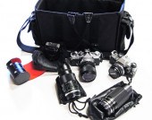 TWO OLYMPUS CAMERA BODIES PLUS