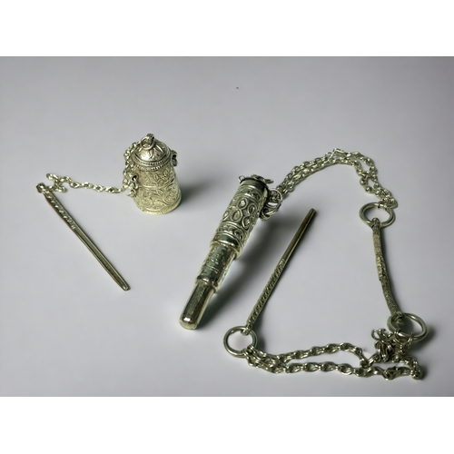 Two Omani silver Kohl pots.With