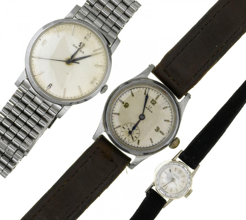 TWO OMEGA STAINLESS STEEL