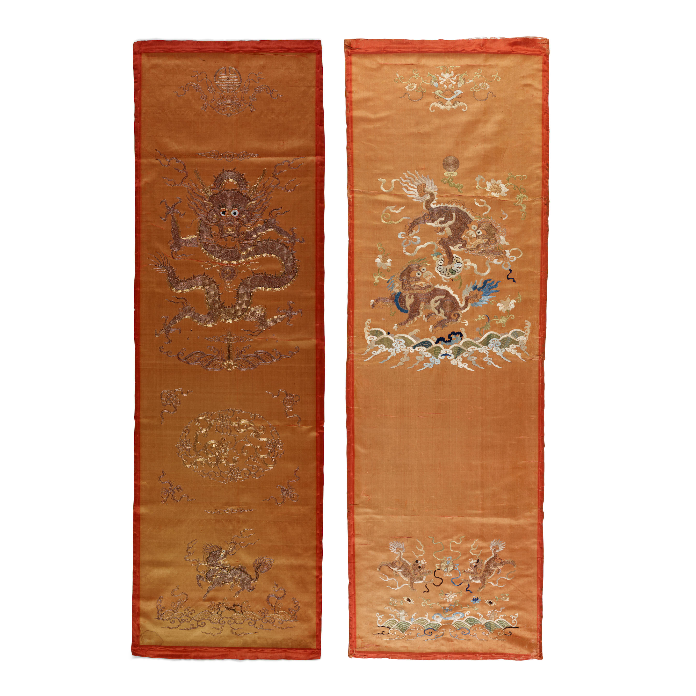 TWO ORANGE-GROUND EMBROIDERED