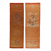 TWO ORANGE-GROUND EMBROIDERED