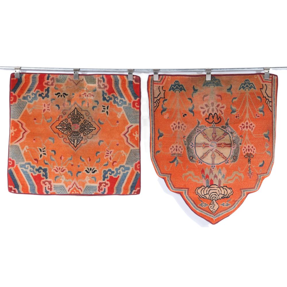 TWO ORANGE TIBETAN THRONE CARPETS