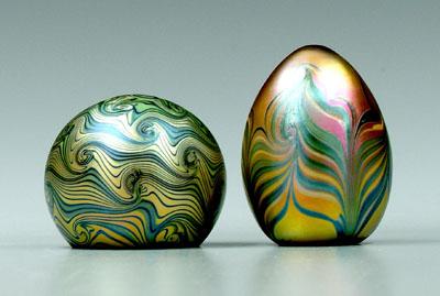 Two Orient & Flume paperweights: