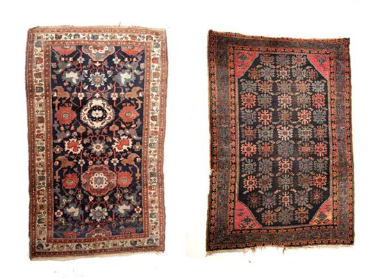 TWO ORIENTAL RUGS.  Twentieth