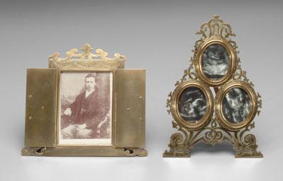 Two ornate brass easel style