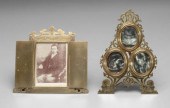 Two ornate brass easel style f