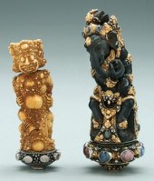 Two ornate Kris handles: one c