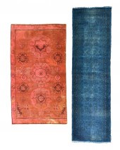 TWO OVERDYED RUGS, ONE KHOTAN,