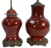 TWO OXBLOOD LANGYAO LAMPS, ONE