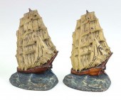 TWO PAINTED CAST IRON CLIPPER