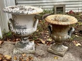 TWO PAINTED CAST IRON GARDEN U