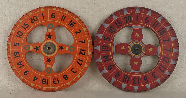 Two painted gaming wheels early