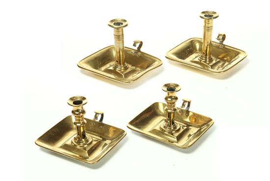 TWO PAIR OF BRASS CHAMBERSTICKS. 